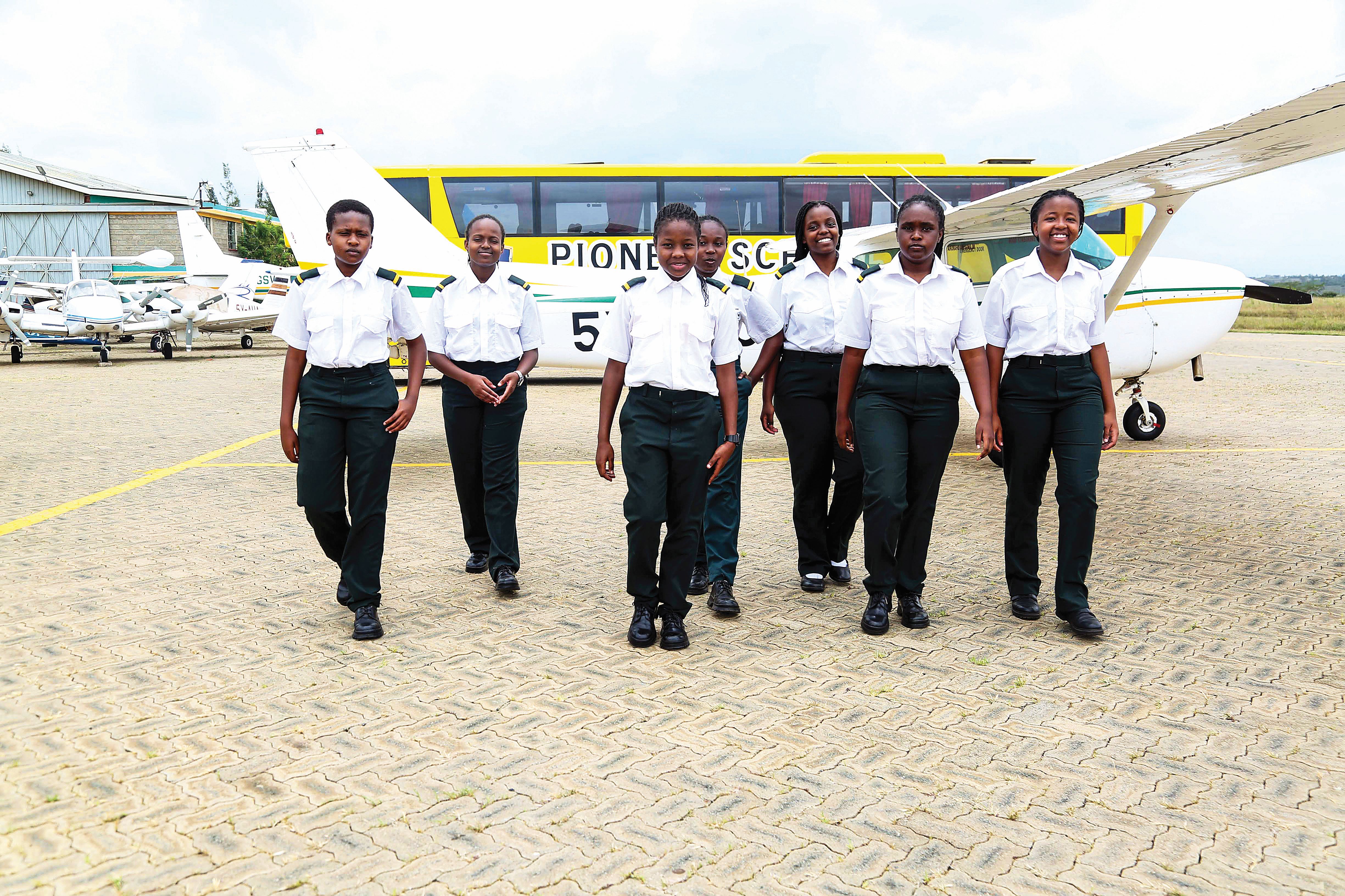 Pioneer girls students at an aviation experience